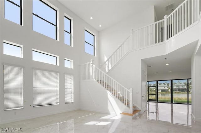 interior space with a high ceiling