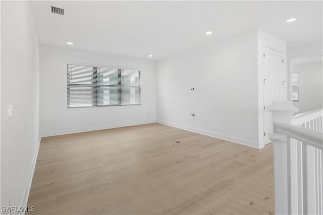 empty room featuring light hardwood / wood-style floors