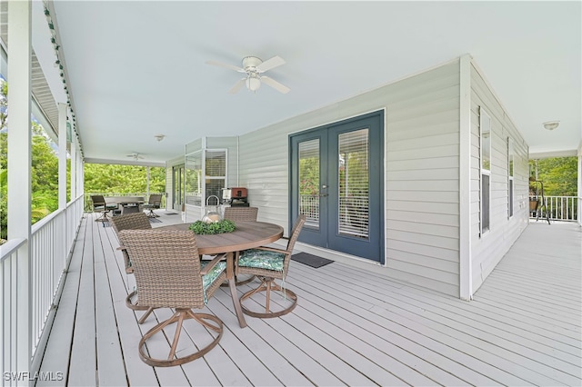 deck with ceiling fan and french doors