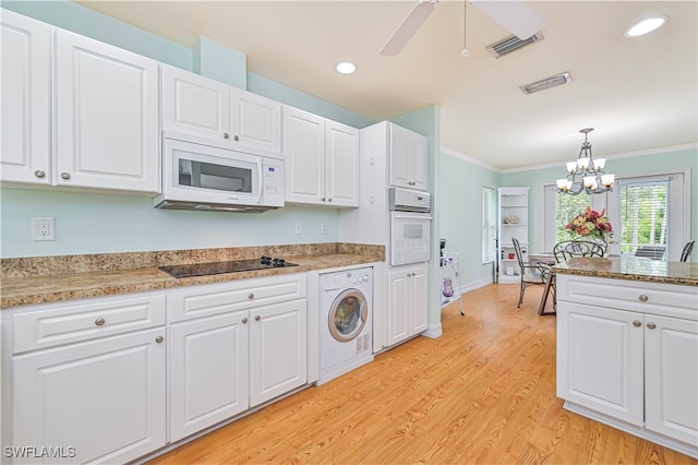 kitchen with white cabinetry, light wood-type flooring, white appliances, and washer / clothes dryer