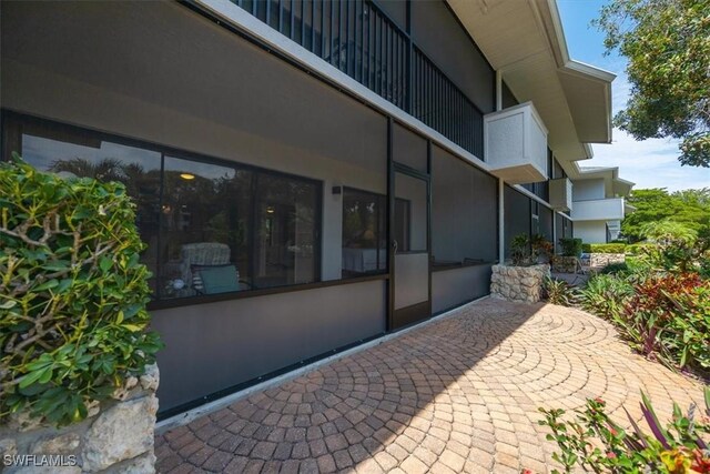 exterior space featuring a balcony