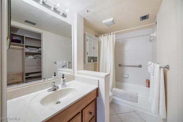 600 Neapolitan Way Unit 115, Naples, FL 34103 - full bathroom featuring tile patterned flooring, shower / bath combination with curtain, visible vents, toilet, and vanity