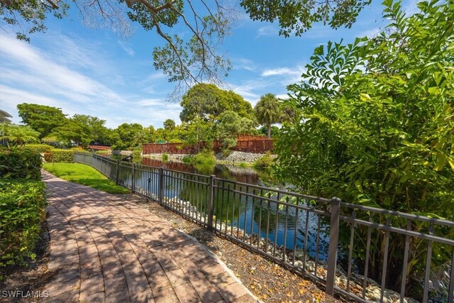 view of home's community featuring a water view