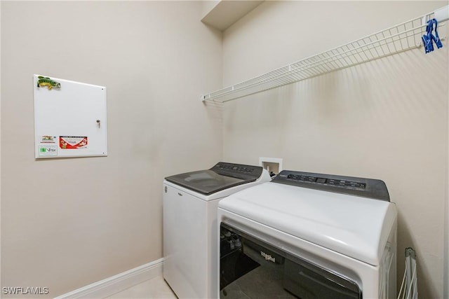 washroom featuring separate washer and dryer