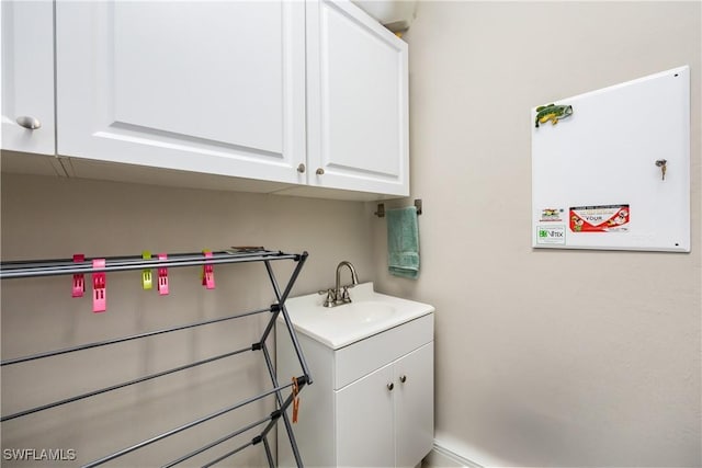 laundry area with sink