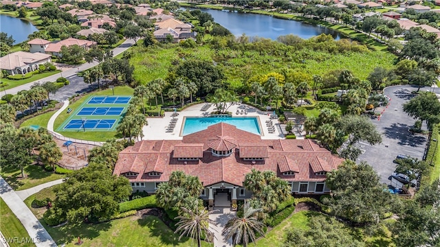 drone / aerial view with a water view