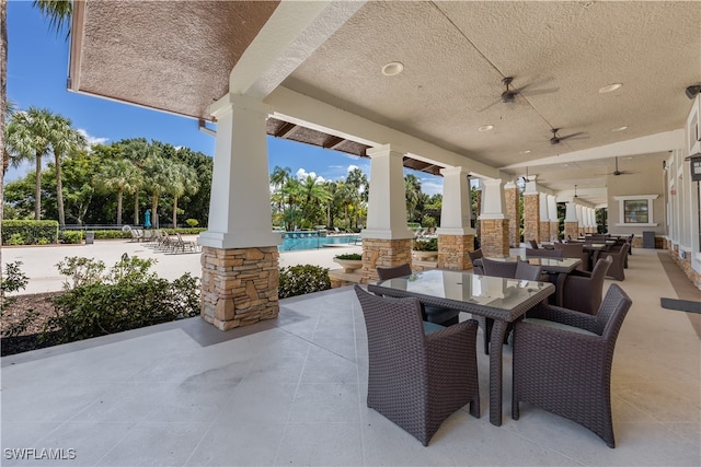 view of patio with ceiling fan