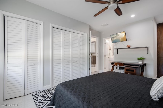 bedroom featuring two closets and ceiling fan