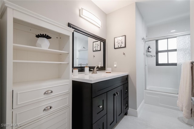 bathroom with vanity, tiled shower / bath combo, and tile patterned floors