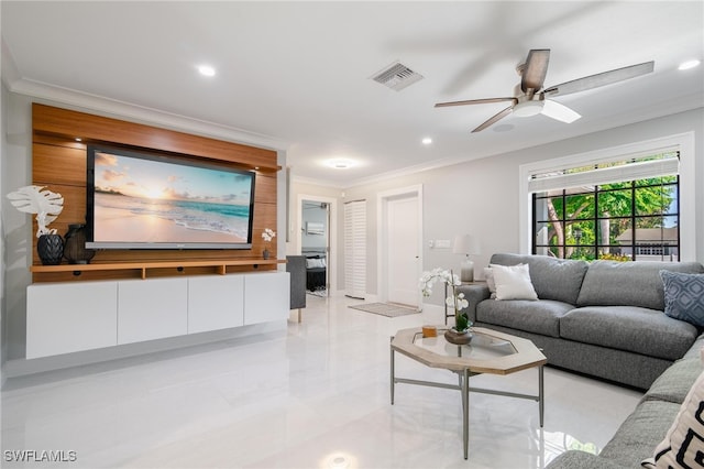 living room with ornamental molding, light tile patterned flooring, and ceiling fan