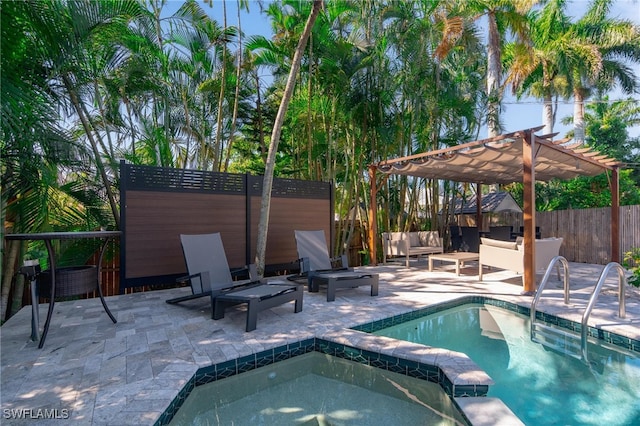 view of pool with a patio area, a pergola, an in ground hot tub, and an outdoor hangout area