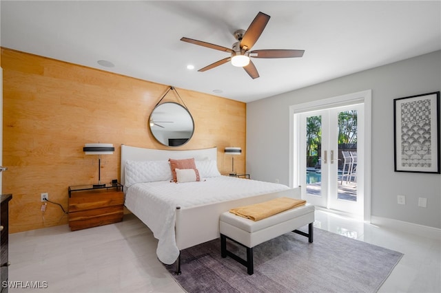 bedroom with access to outside, french doors, and ceiling fan