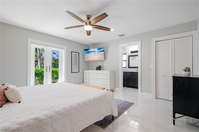 bedroom with connected bathroom, ceiling fan, a closet, and access to outside