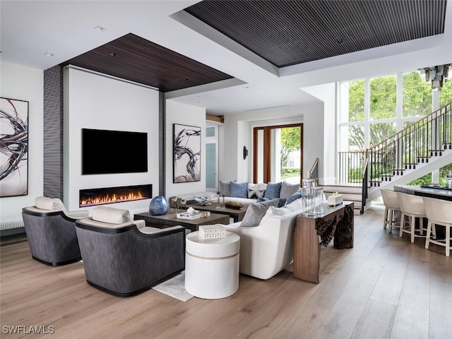 living room with light hardwood / wood-style flooring