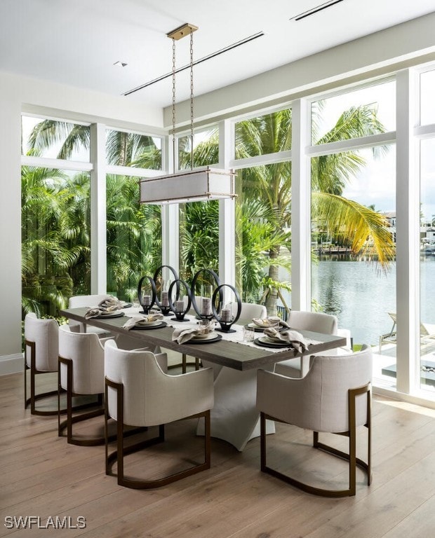 sunroom with a water view