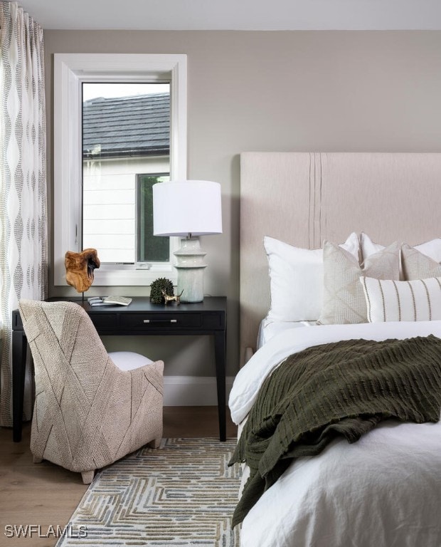 bedroom featuring light wood-type flooring