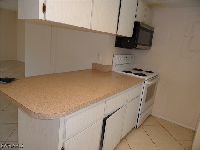 kitchen featuring kitchen peninsula, white range with electric cooktop, and light tile patterned floors