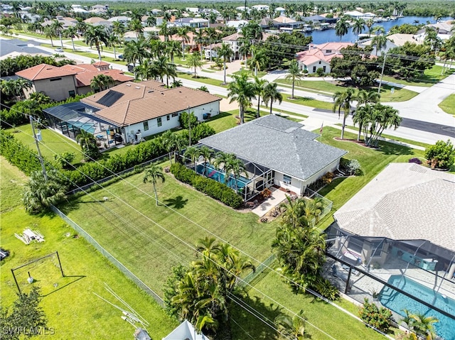 drone / aerial view with a water view