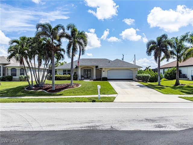 ranch-style house with a garage and a front lawn