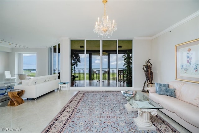 living room with a chandelier, tile patterned flooring, floor to ceiling windows, and crown molding