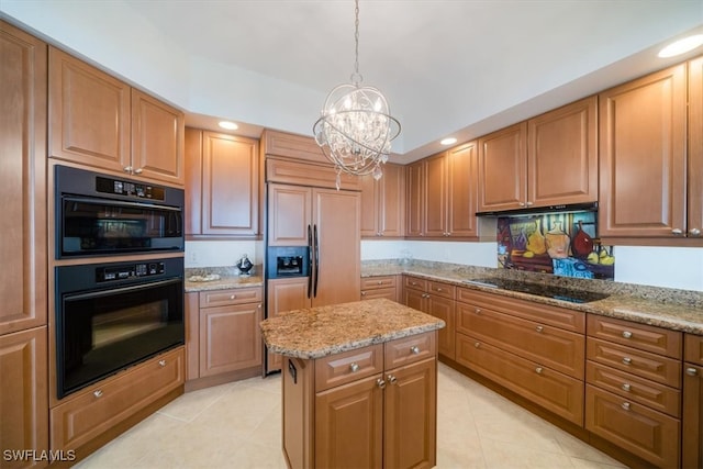 kitchen with black appliances, pendant lighting, a chandelier, a kitchen island, and light tile patterned flooring