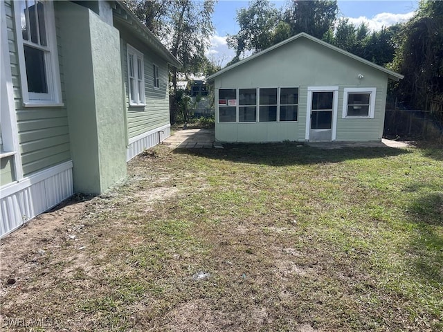 exterior space with a yard