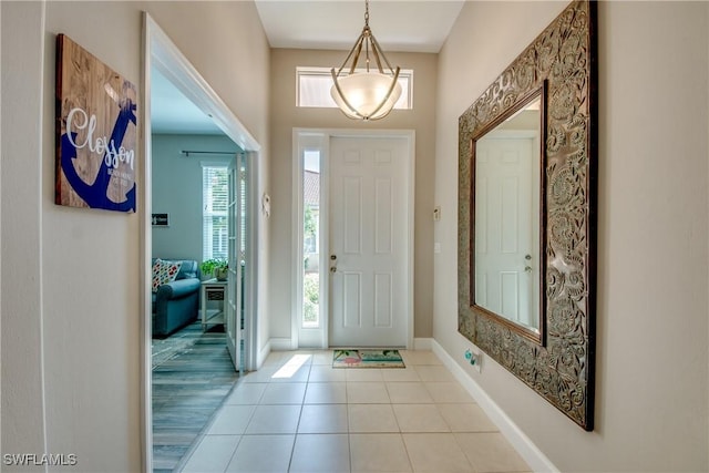 foyer entrance featuring light tile patterned floors