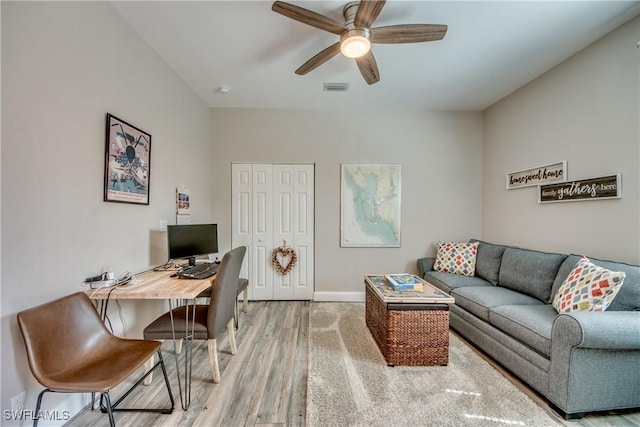 home office featuring ceiling fan and wood-type flooring