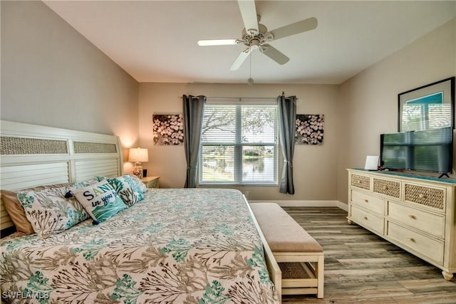 bedroom featuring light hardwood / wood-style floors and ceiling fan