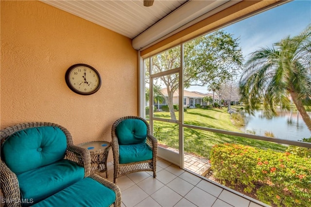 sunroom with a water view