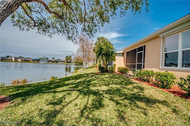 view of yard featuring a water view