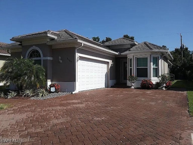 view of front of home featuring a garage