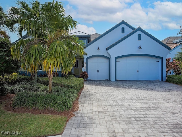 view of front of property with a garage