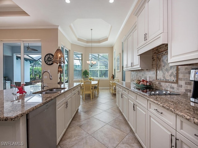 kitchen featuring white cabinetry, dishwasher, and sink