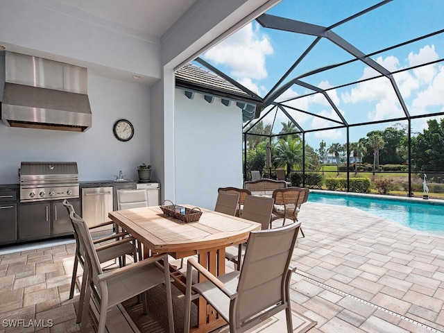 view of patio / terrace featuring glass enclosure and area for grilling