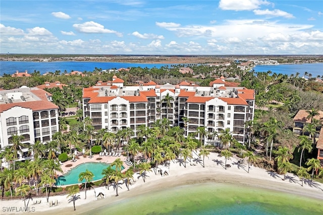 drone / aerial view with a view of the beach and a water view