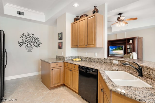 kitchen with sink, ornamental molding, a tray ceiling, black dishwasher, and ceiling fan