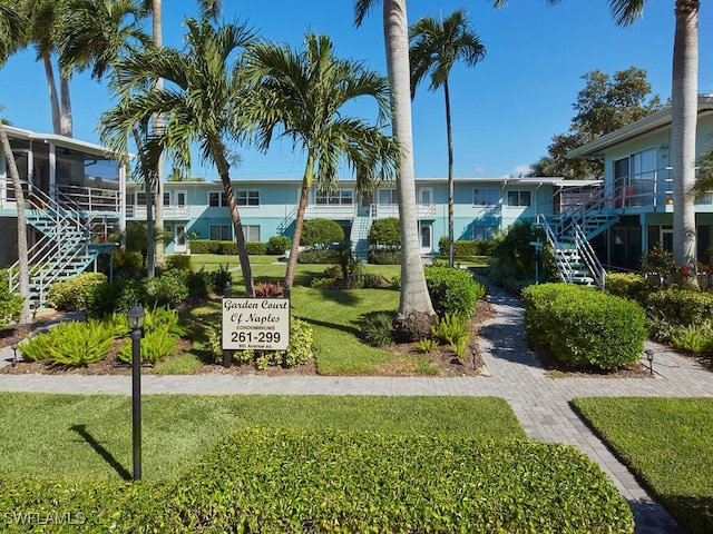 271 8th Ave S Unit 271, Naples, FL 34102 - view of community with stairway and a yard