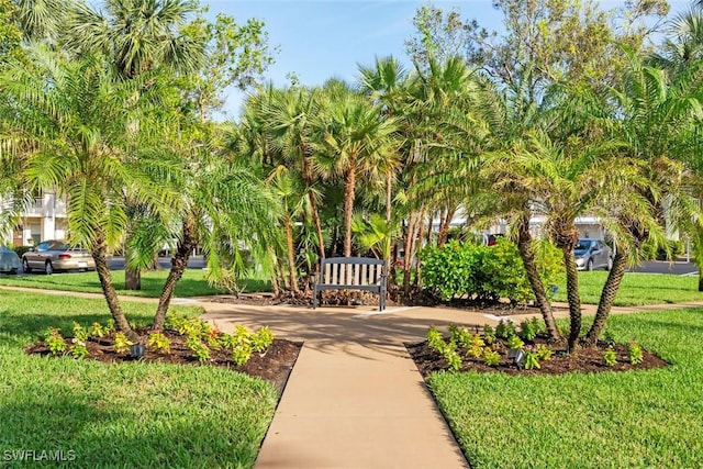 28710 Bermuda Bay Way Unit 104, Bonita Springs, FL 34134 - view of property's community with a yard