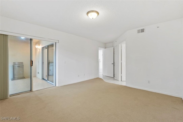 28710 Bermuda Bay Way Unit 104, Bonita Springs, FL 34134 - unfurnished bedroom featuring carpet and baseboards