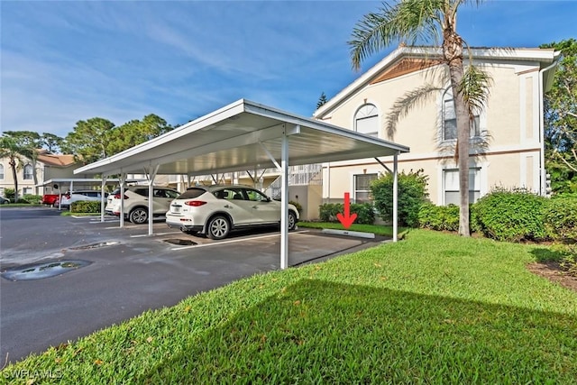 28710 Bermuda Bay Way Unit 104, Bonita Springs, FL 34134 - view of covered parking lot