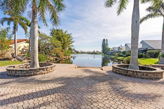 28710 Bermuda Bay Way Unit 104, Bonita Springs, FL 34134 - view of patio with a water view
