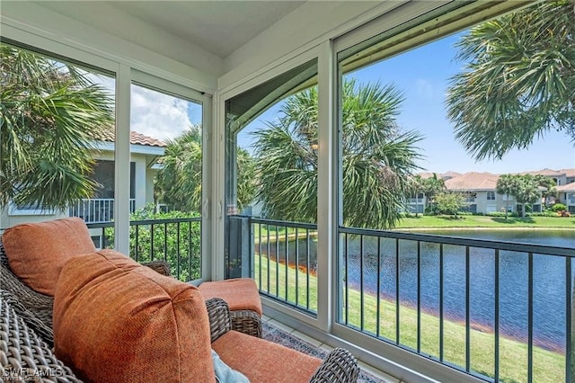 sunroom with a water view