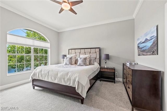 bedroom featuring baseboards, carpet flooring, and crown molding