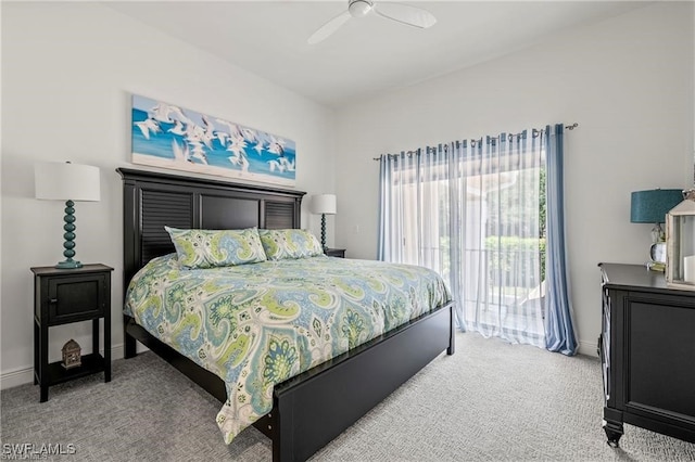 bedroom with access to outside, light colored carpet, baseboards, and ceiling fan