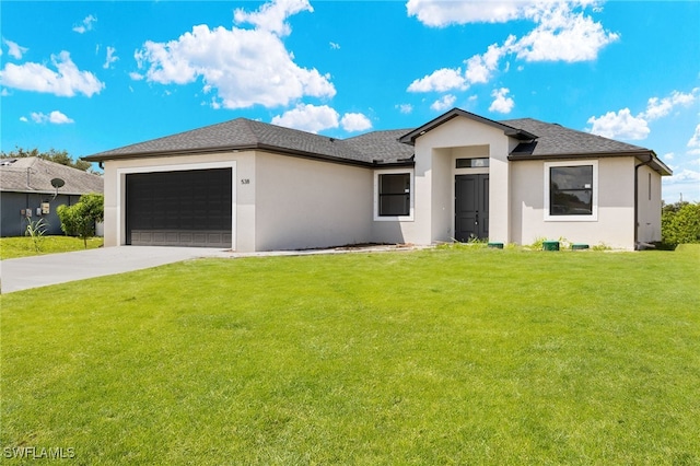 view of front facade featuring a front yard and a garage