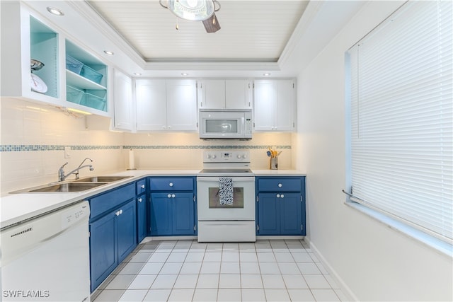 kitchen featuring white cabinetry, light tile patterned flooring, white appliances, a tray ceiling, and ceiling fan