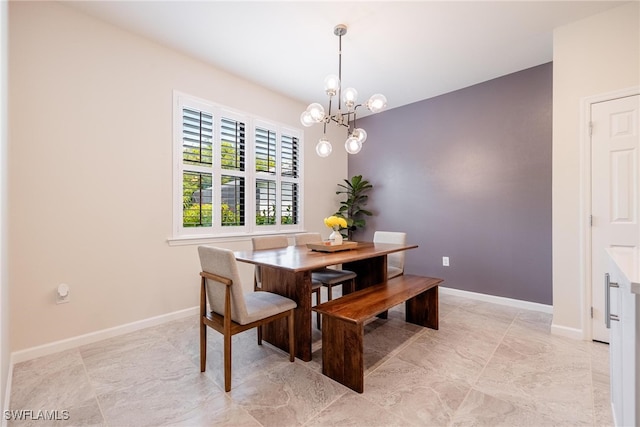 dining area featuring a chandelier