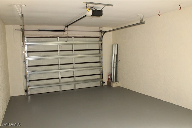 garage featuring a garage door opener