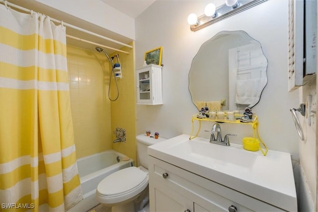 full bathroom featuring toilet, shower / tub combo, and vanity